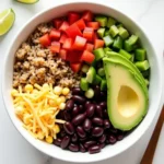 Black Bean Taco Bowl with rice, beans, avocado, and fresh toppings
